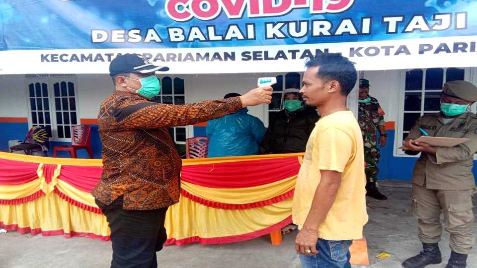Mardison Mahyuddin Periksa Kesehatan Pengendara di Posko Pemeriksaan Covid-19